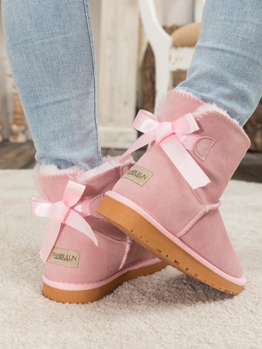 Uggs with sales ribbons on back