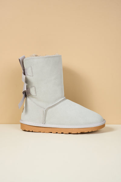 Smaibulun Ugg | Double Ballet Ribbon Bow Suede Shearling Boots - pale