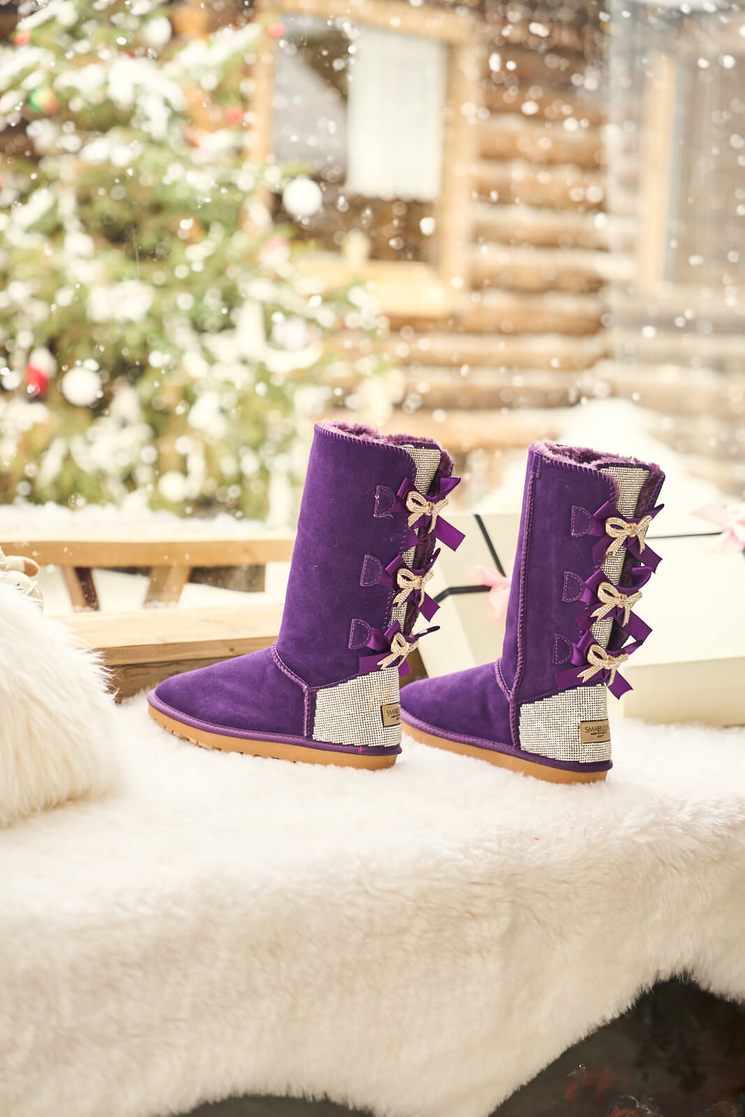 SMAIBULUN Ugg | Rhinestone Ribbon Tri-Tie Bow Suede Boots - violet