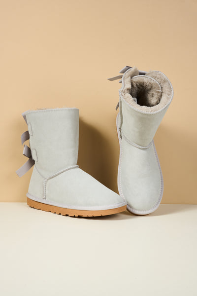 Smaibulun Ugg | Double Ballet Ribbon Bow Suede Shearling Boots - pale