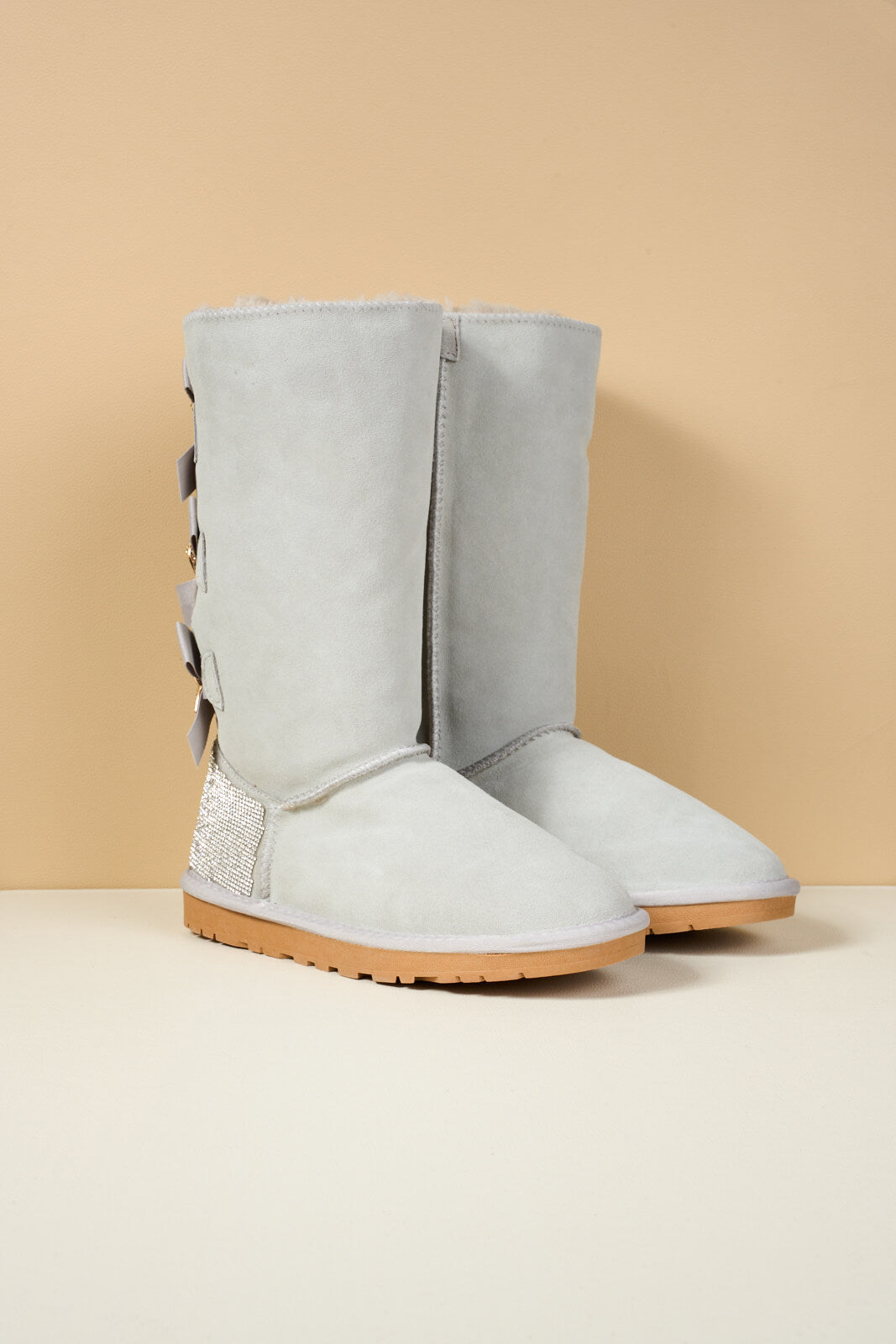 SMAIBULUN Ugg | Rhinestone Ribbon Tri-Tie Bow Suede Boots - pale