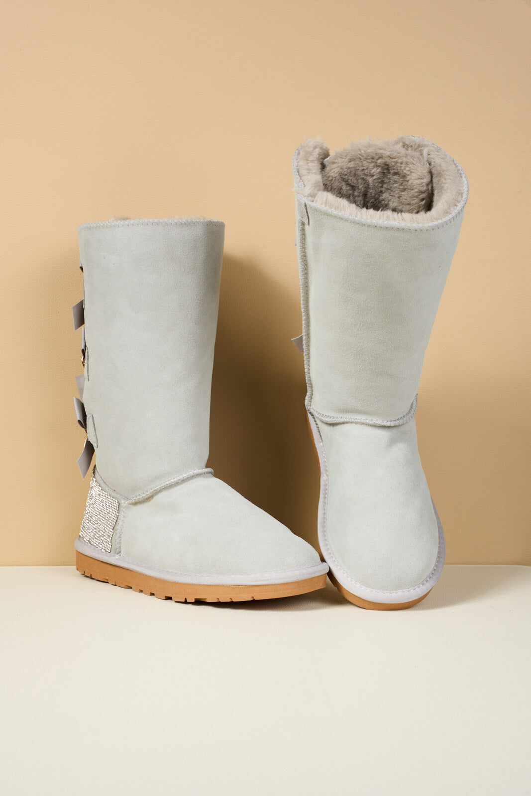 SMAIBULUN Ugg | Rhinestone Ribbon Tri-Tie Bow Suede Boots - pale