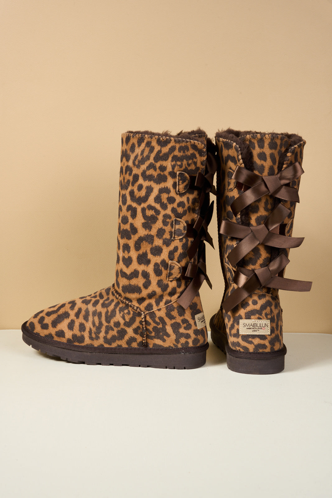 SMAIBULUN Ugg | Tri Ribbon Bow Suede Boots - cheetah