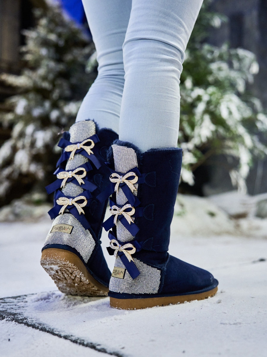 SMAIBULUN Ugg | Rhinestone Ribbon Tri-Tie Bow Suede Boots - Navy