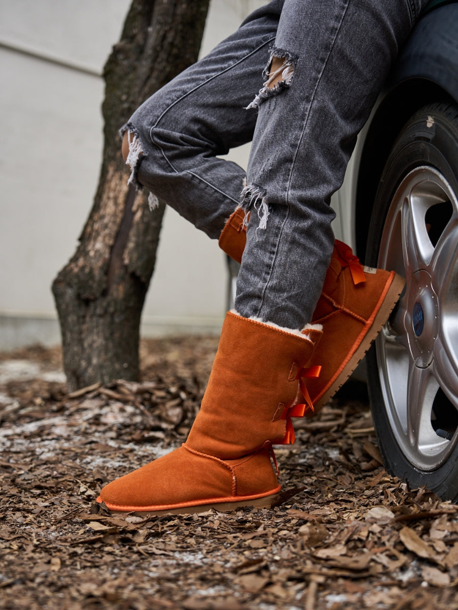 SMAIBULUN Ugg | Tri Ribbon Bow Suede Boots - Orange