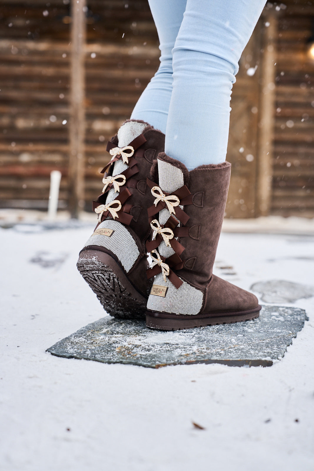 SMAIBULUN Ugg | Rhinestone Ribbon Tri-Tie Bow Suede Boots - brown