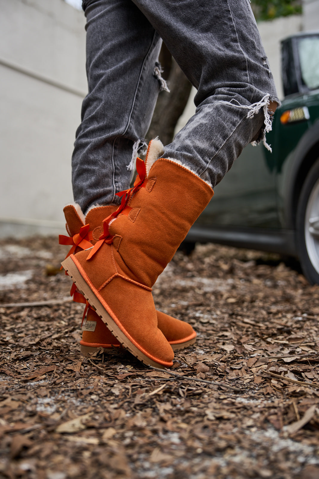 SMAIBULUN Ugg | Tri Ribbon Bow Suede Boots - Orange