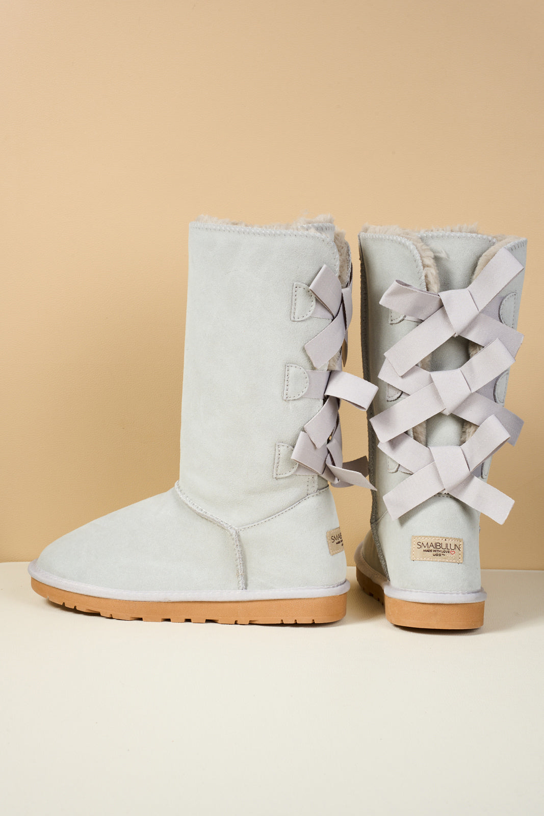 SMAIBULUN Ugg | Tri Ribbon Bow Suede Boots - pale