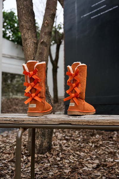 SMAIBULUN Ugg | Tri Ribbon Bow Suede Boots - Orange