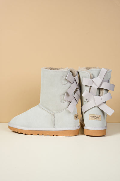 Smaibulun Ugg | Double Ballet Ribbon Bow Suede Shearling Boots - pale