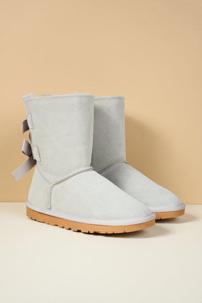 Smaibulun Ugg | Double Ballet Ribbon Bow Suede Shearling Boots - pale