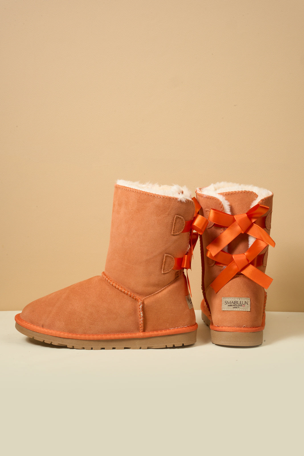 Smaibulun Ugg | Double Ballet Ribbon Bow Suede Shearling Boots - orange