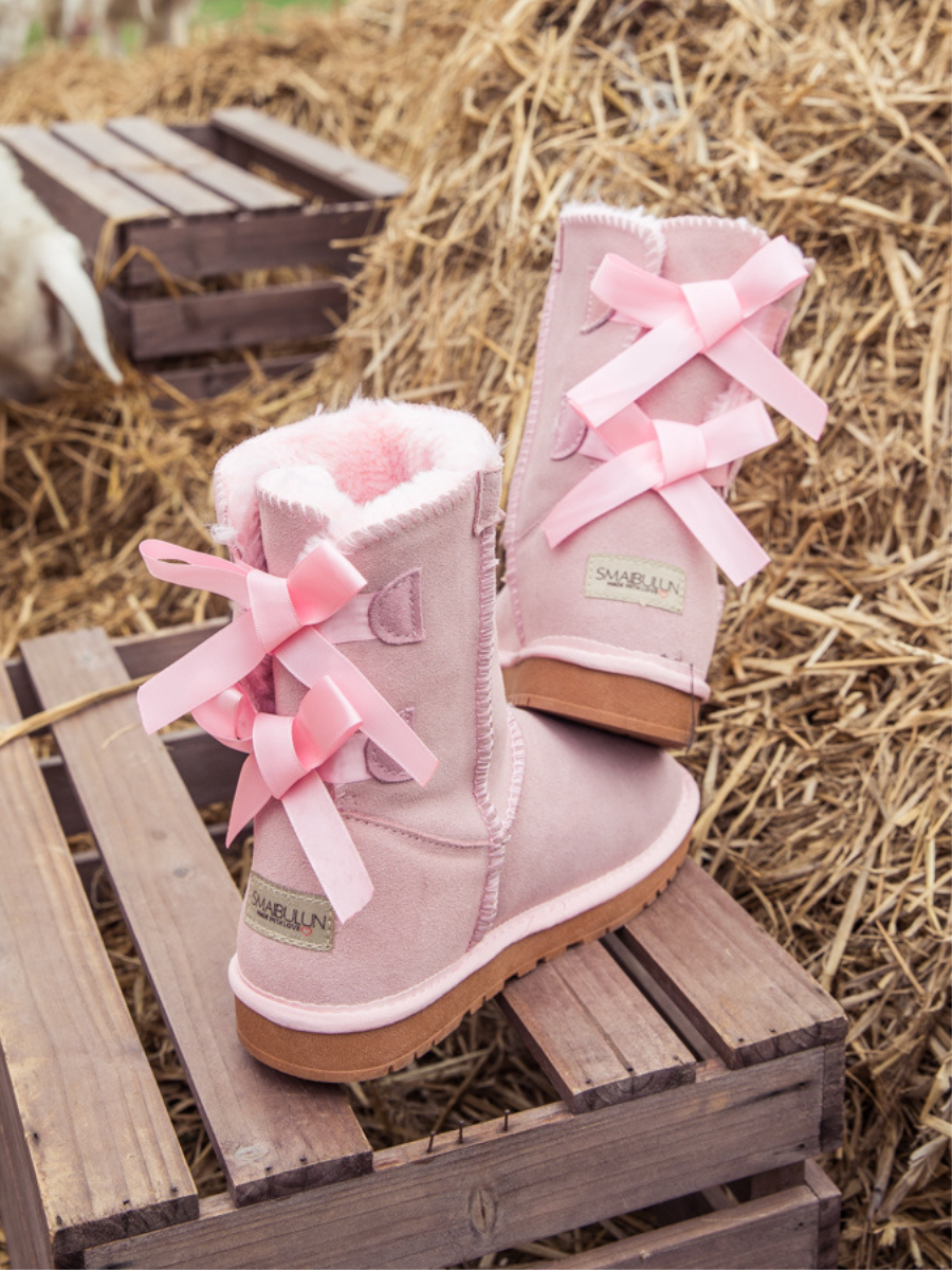 Pink bow tie uggs deals