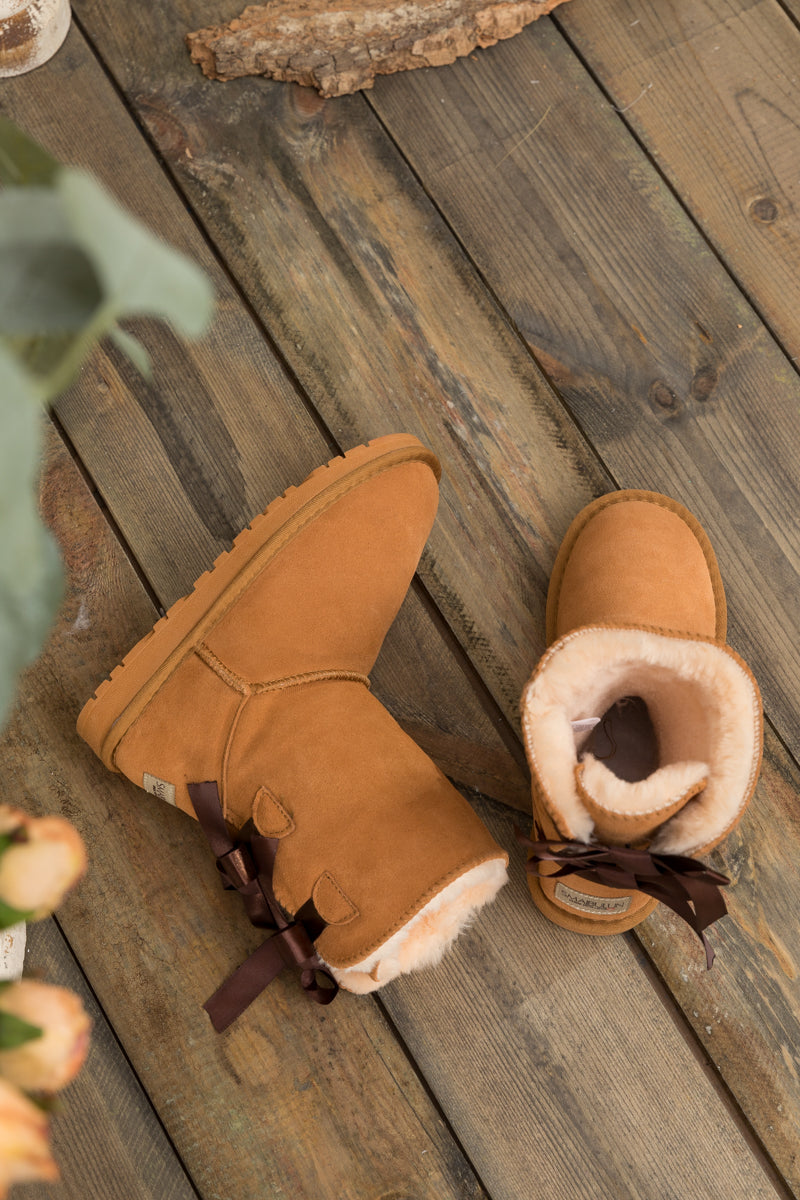 Brown boots with bows best sale