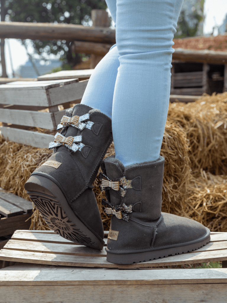 Tall gray ugg top boots with bows