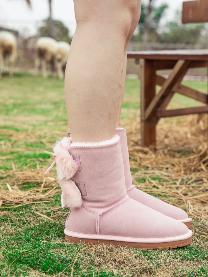 Pink ugg boots with bows hotsell