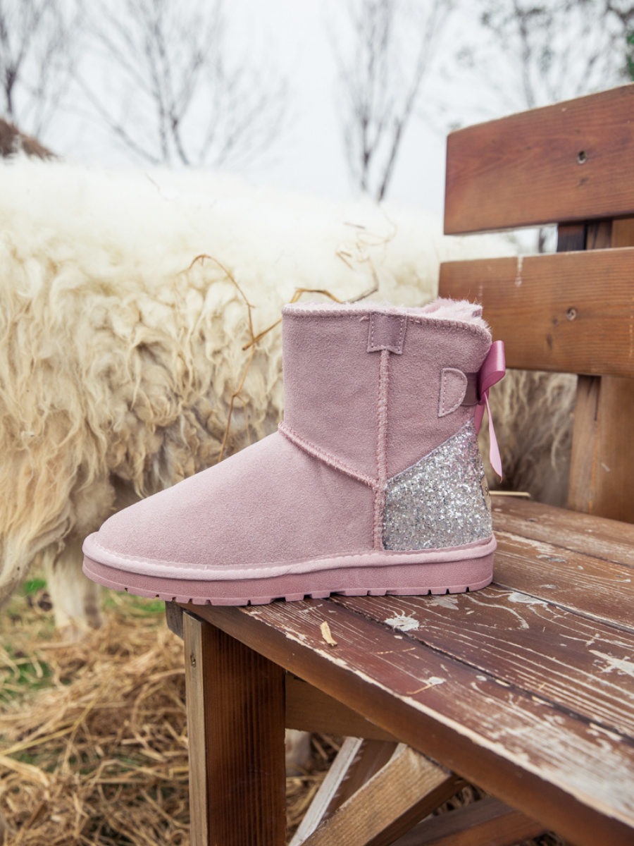 Pink fluffy ugg boots best sale