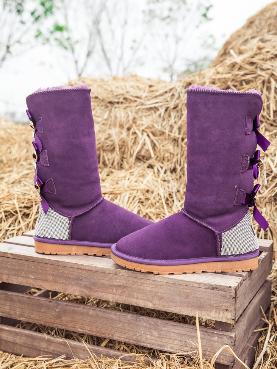Light purple uggs with 2025 bows