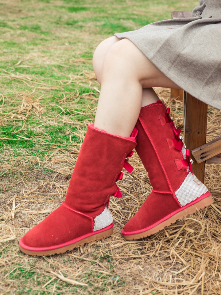 Red uggs with ribbon fashion on back